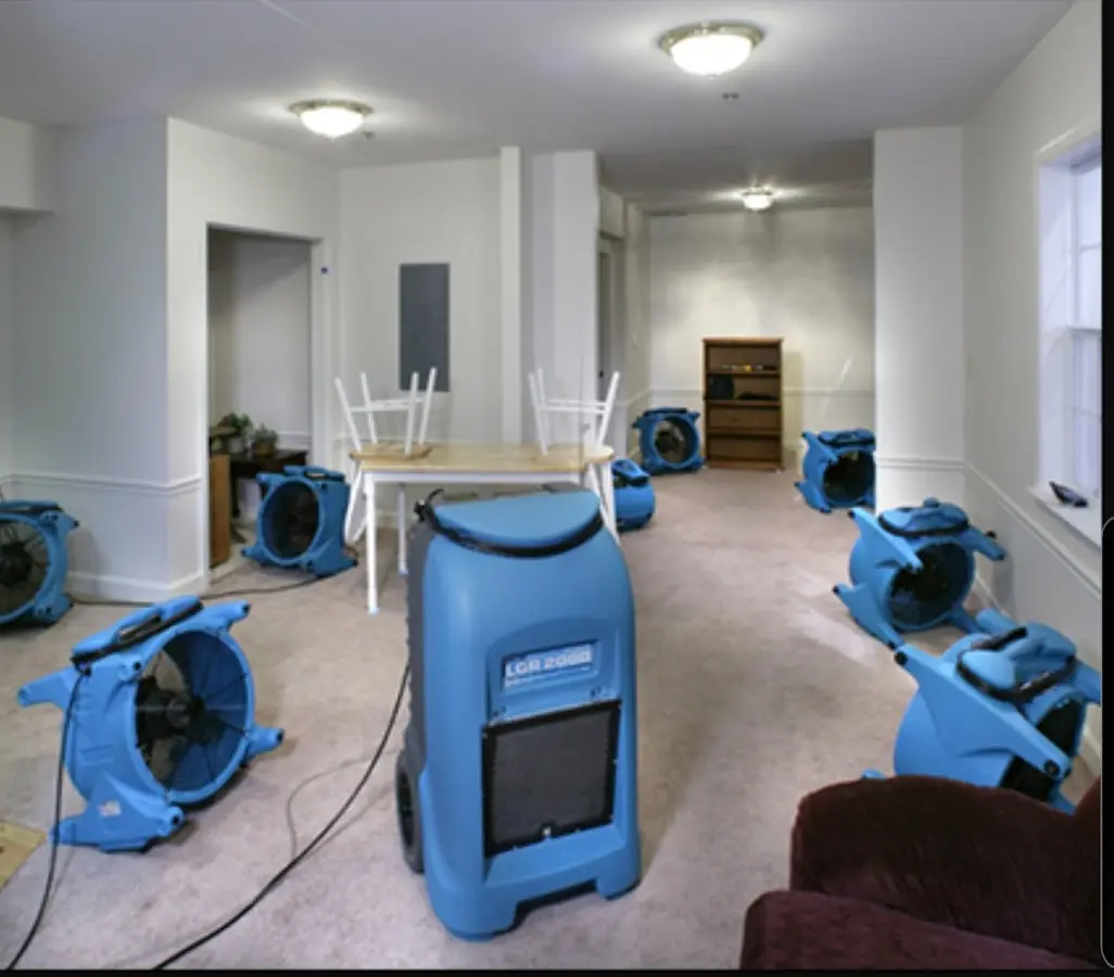 Air movers and dehumidifier setup for Water Damage Restoration in Eldorado at Santa Fe